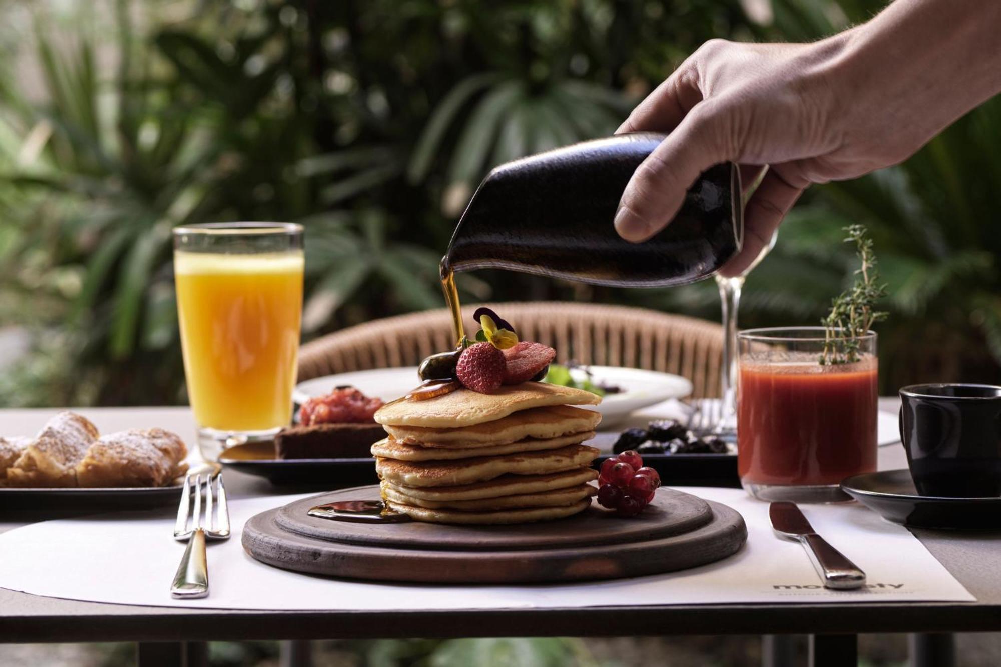 Monasty, Thessaloniki, Autograph Collection Hotel Exterior photo Maple syrup being poured on a stack of pancakes